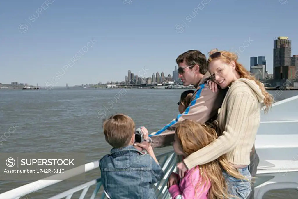 Family sightseeing on a ferry boat