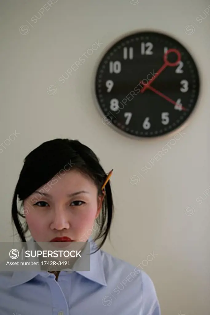 Young woman and clock, portrait