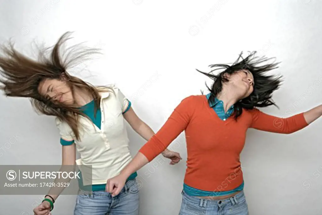 View of two teenage girls going wild