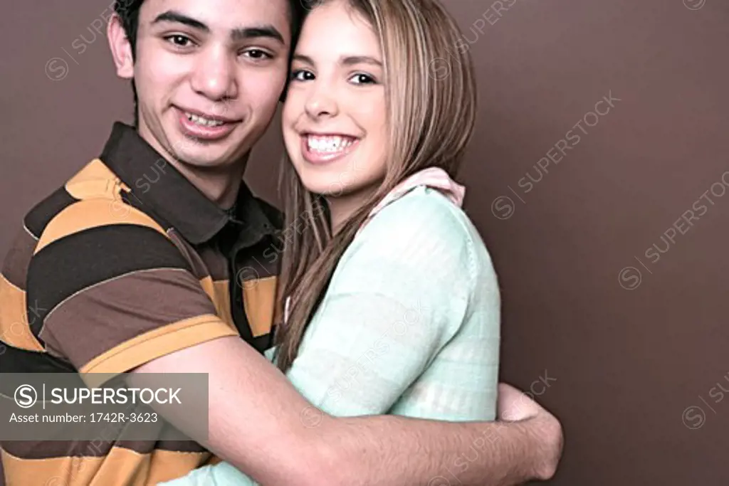 Portrait of a couple embracing.