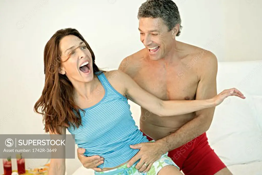 View of a couple in a playful mood.