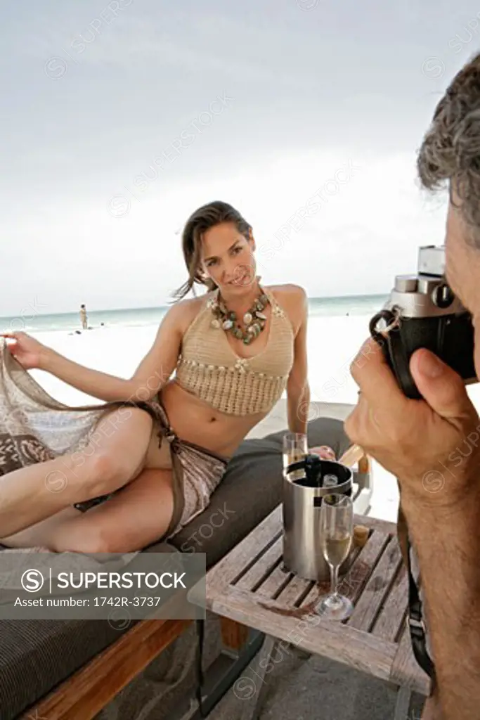 View of a woman on a deck chair.