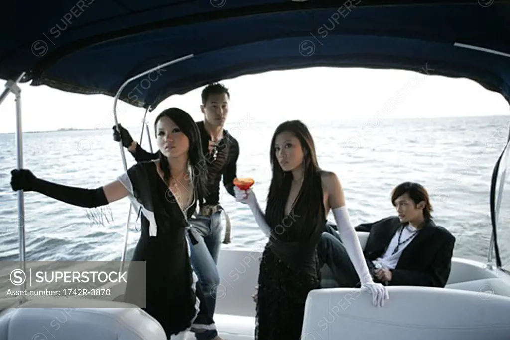 View of two couples in a yacht.