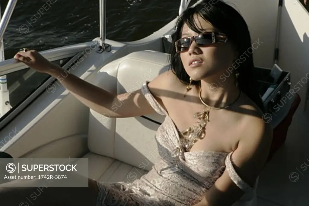 View of a young woman in a yacht.