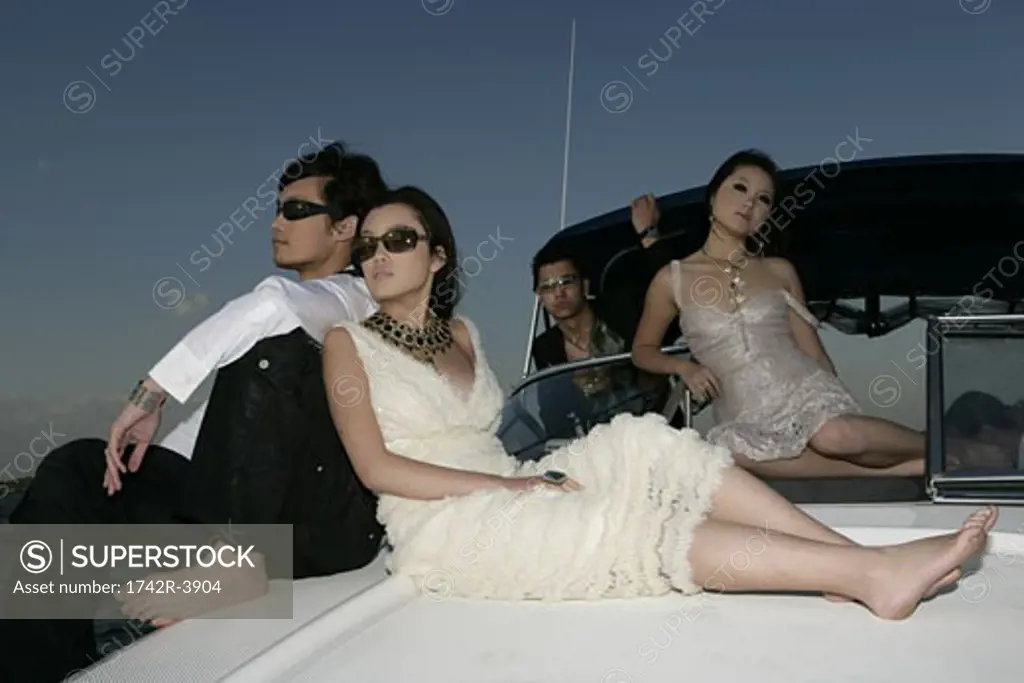 View of two couples on a yacht.