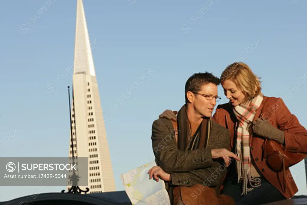 Mature couple with Transamerica Pyramid in the background