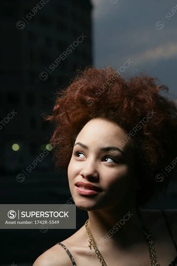 african american female posing looking away
