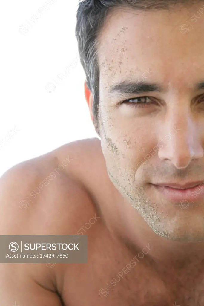 Close-up of young barechest man.