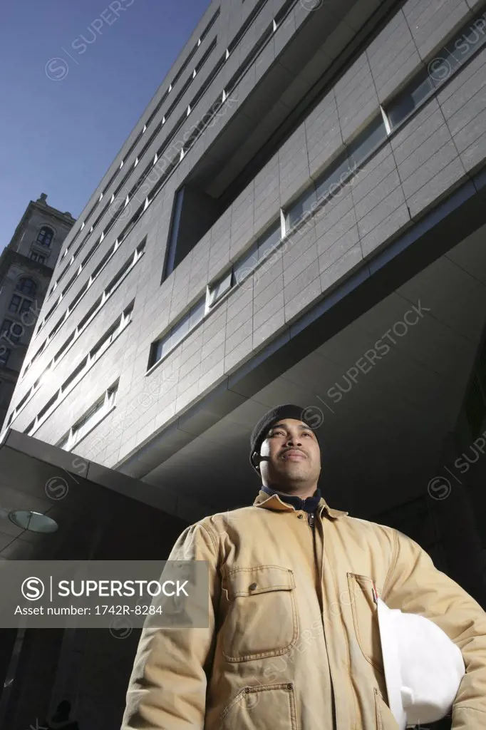 African American male construction worker outdoors.