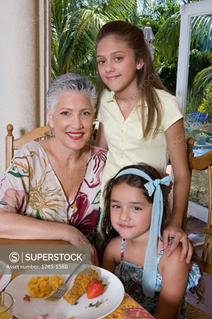 Senior woman with her granddaughters