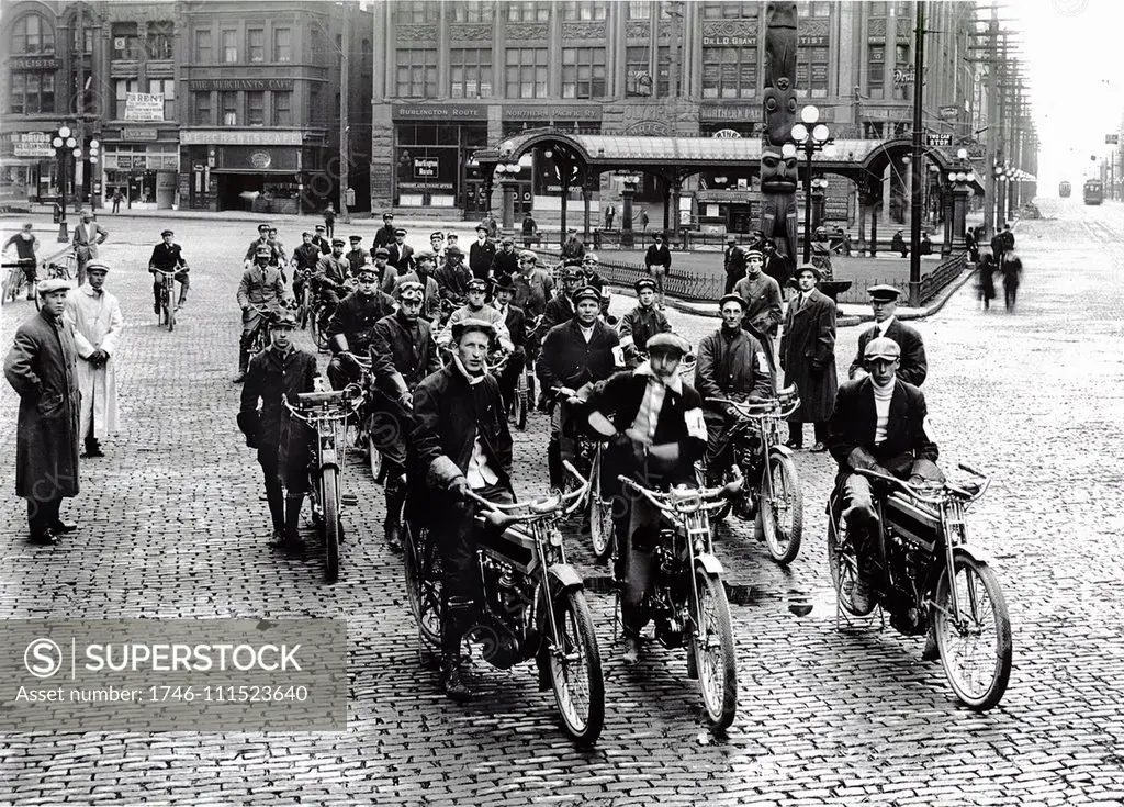 Photograph of a motorcycle gang sitting on their bikes in Seattle. Dated 1914