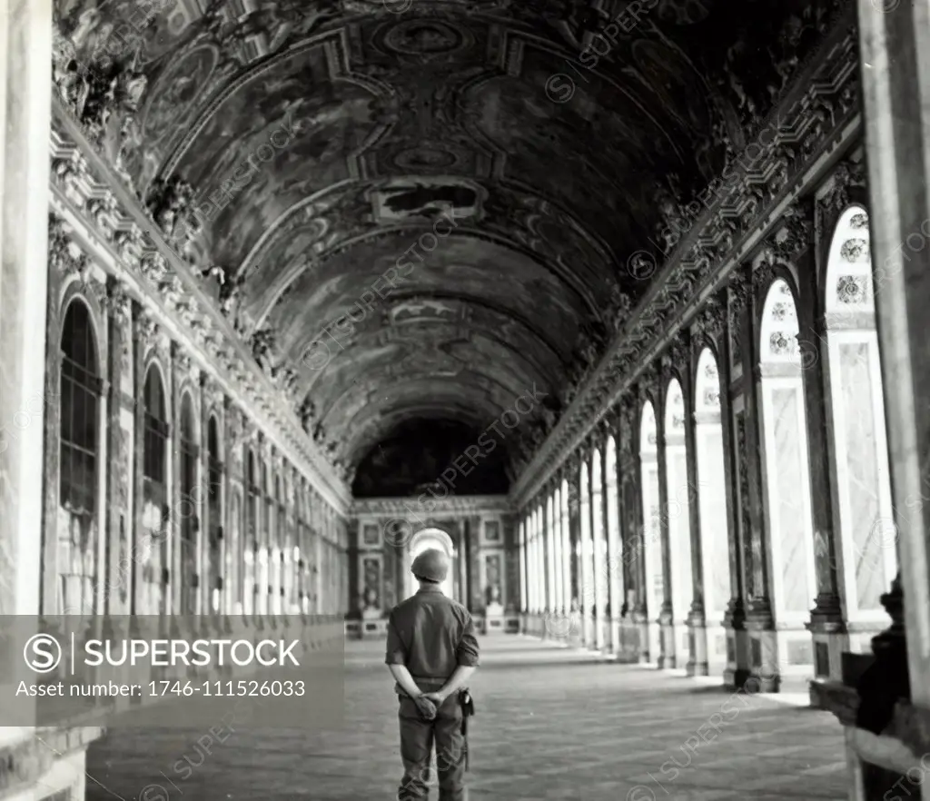 American soldier Versailles standing in the hall of mirrors 1944. World War two