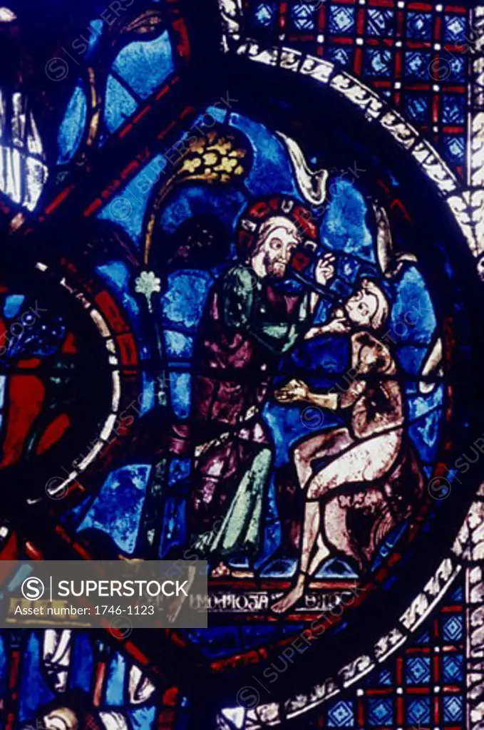 God creating Adam. Chatres Cathedral stained glass window of the Good Samaritan. 13th century