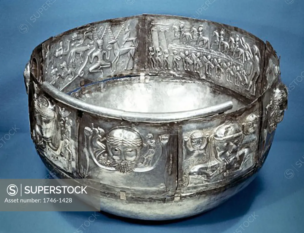 Gundestrup Cauldron (bowl), Celtic ritual vessel of 2nd century BC. Inside on right is Cernunnos, King of the animals. Silver partially gilded. Danish National Museum, Copenhagen.