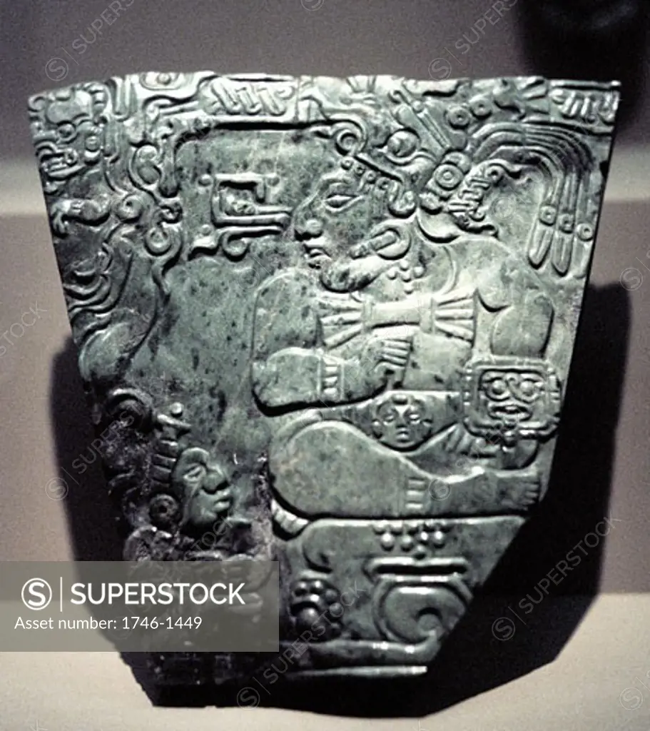 Jade plaque showing Mayan king seated, 400-800.