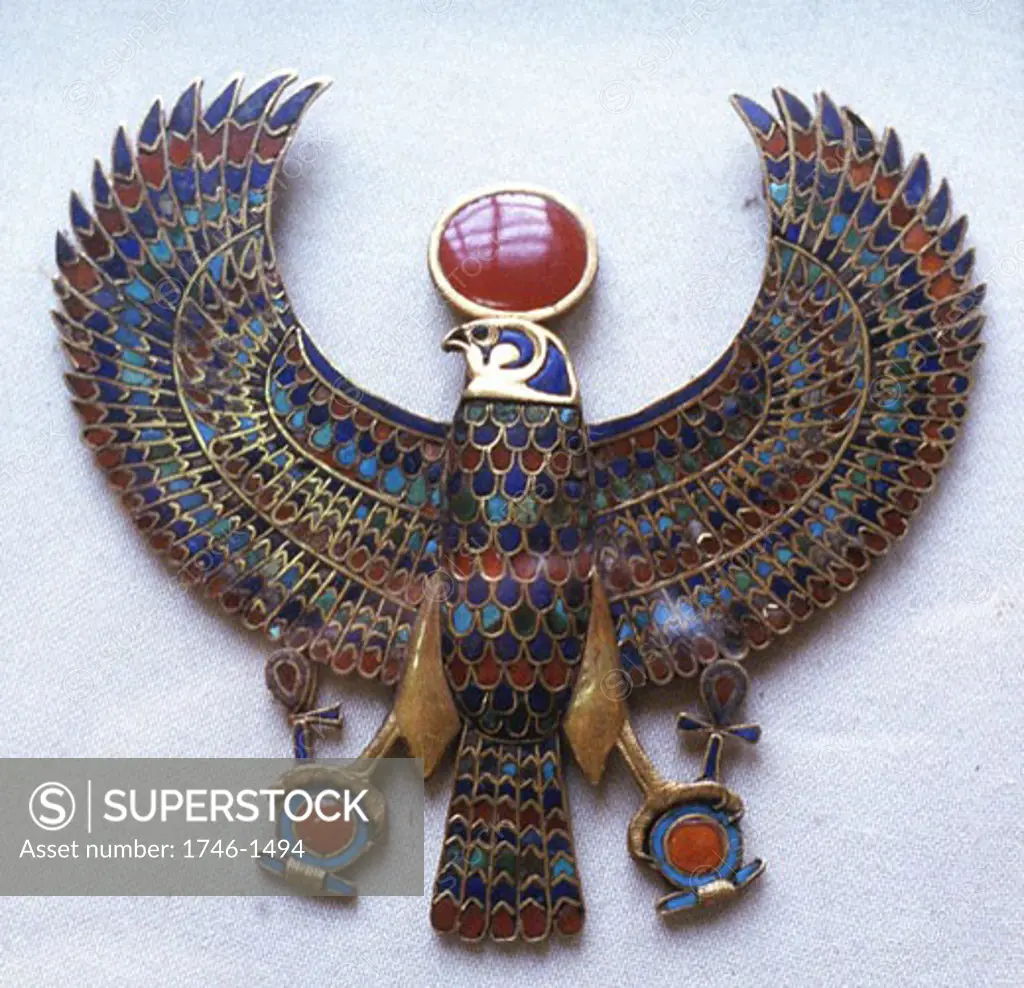 Pectoral jewel from treasure of Tutankhamun showing falcon headed god with sun disk (Aton)