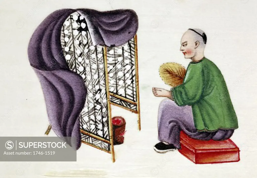 Man drying silkworm cocoons over a charcoal pan surrounded by bamboo screen and using blanket and fan to regulate draught. Chinese tempera painting on rice paper (19th century)