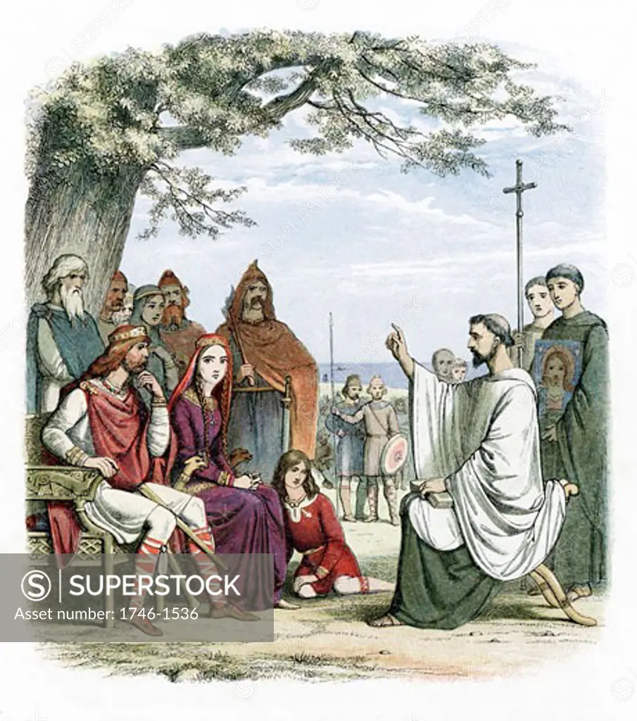 St. Augustine of Canterbury (d.604) preaching before Ethelbert (552-616) Anglo-Saxon king of Kent whom he baptised in 597. Augustine sent by Pope Gregory I to convert Anglo-Saxons to Christianity. First Archbishop of Canterbury.Colour-printed wood engraving, London, 1864 