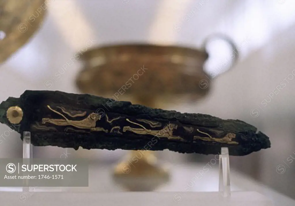 Mycenean dagger with lion decoration. c1450-c1100 BC