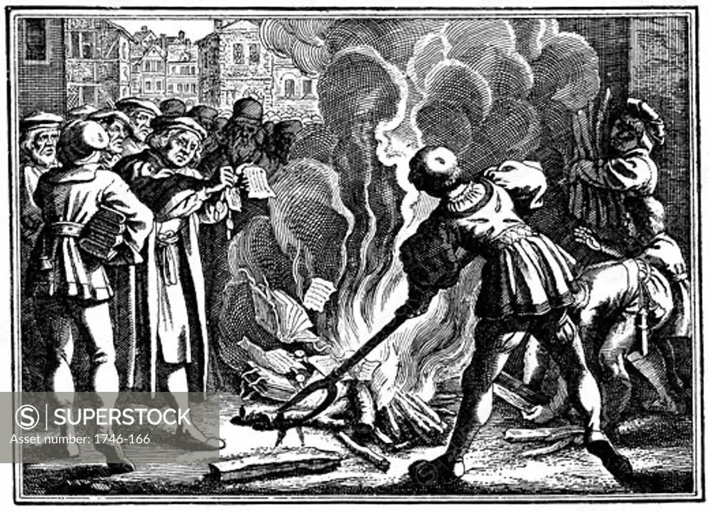 Martin Luther (1483-1546) German Protestant reformer, burning the Papal Bull excommunicating him. Wittenberg, 1520