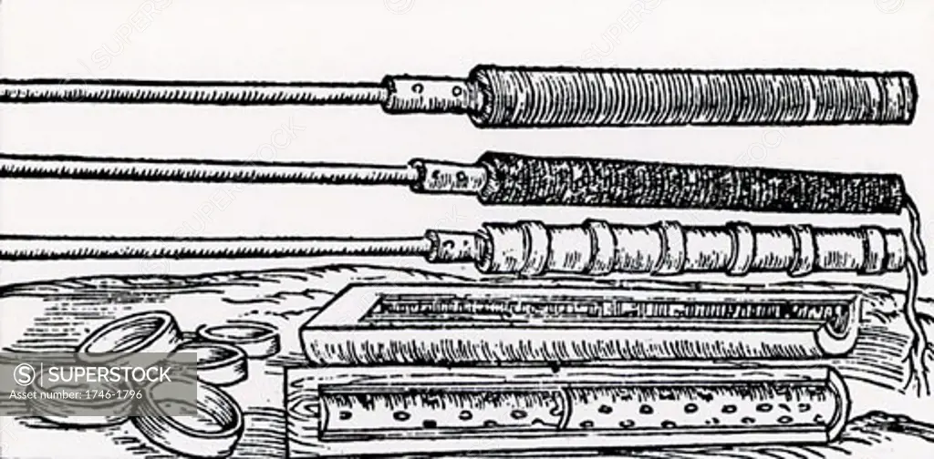 Moulds for making fire tubes.  These were fired from cannon, either at enemy forces or for setting fire to wooden gates.  From "De la pirotechnia" by Vannoccio Biringuccio (Venice, 1540).  Woodcut.