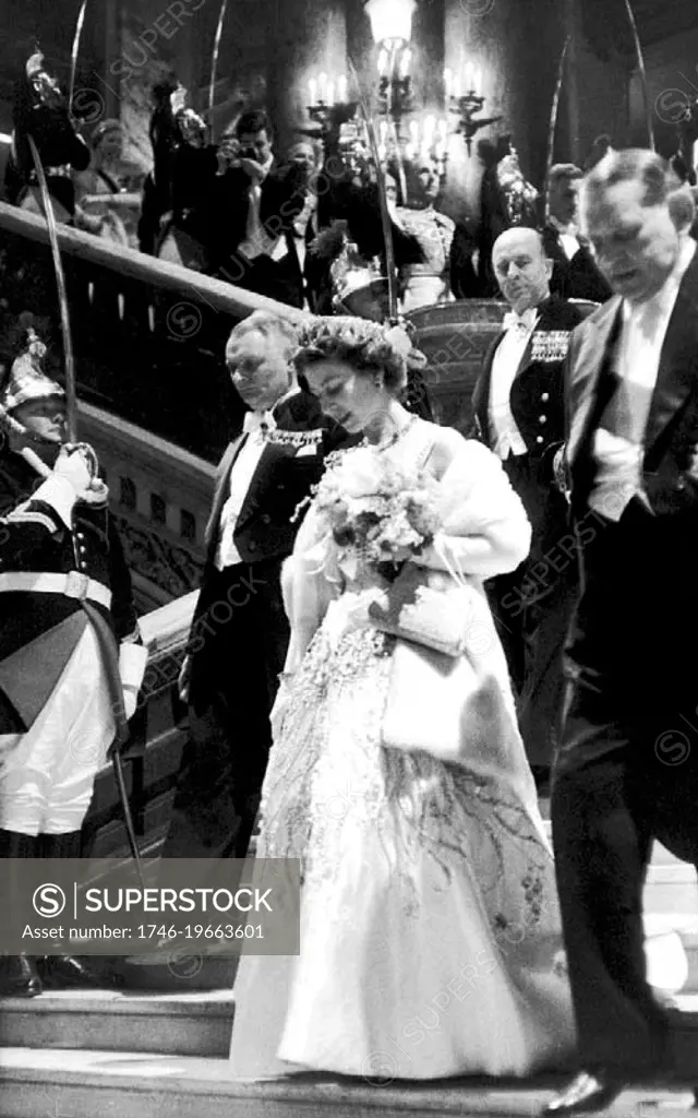 Queen Elizabeth II of the United Kingdom on a state visit to Paris in 1957, at the Elysee Palace with President Rene Coty.
