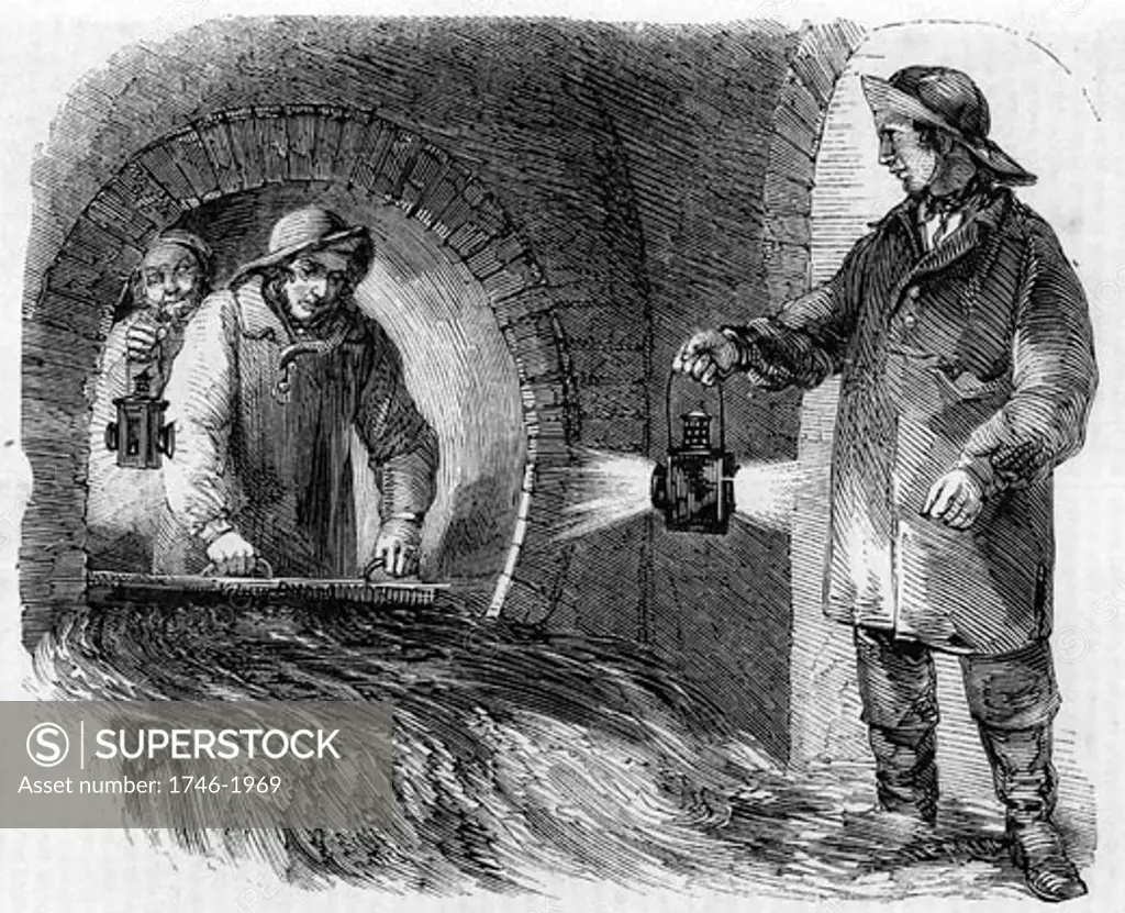 Flushing a London sewer.  The men are dressed in oilskins and hold bull's eye lanterns to give them enough light to carry out their work.  Engraving from London Labour and the London Poor by Henry Mayhew (London, 1861).