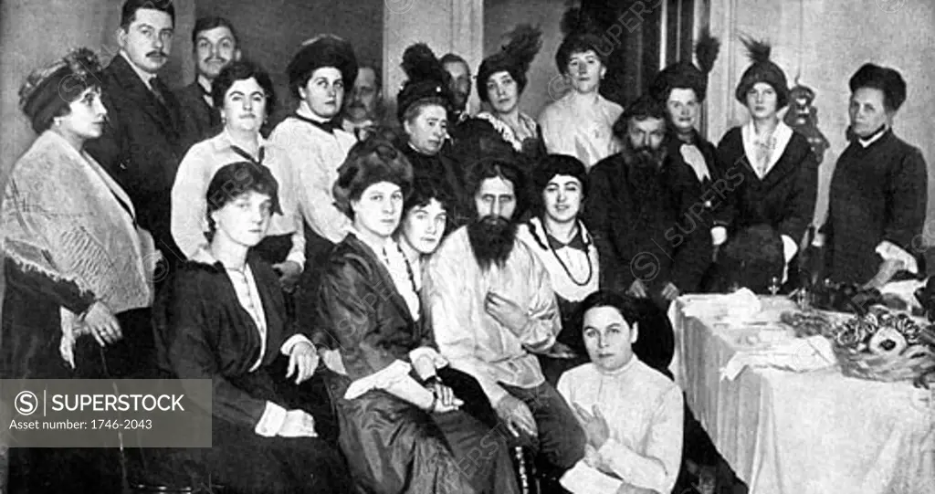 Grigori Yefimovich Rasputin, Russian monk and mystic surrounded by some of the women drawn by his magnetic personality