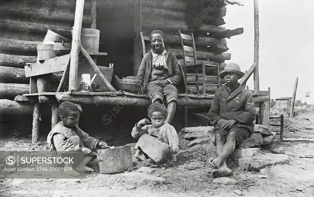 African-American children outside their sharecropper home in the Southern USA 1920.