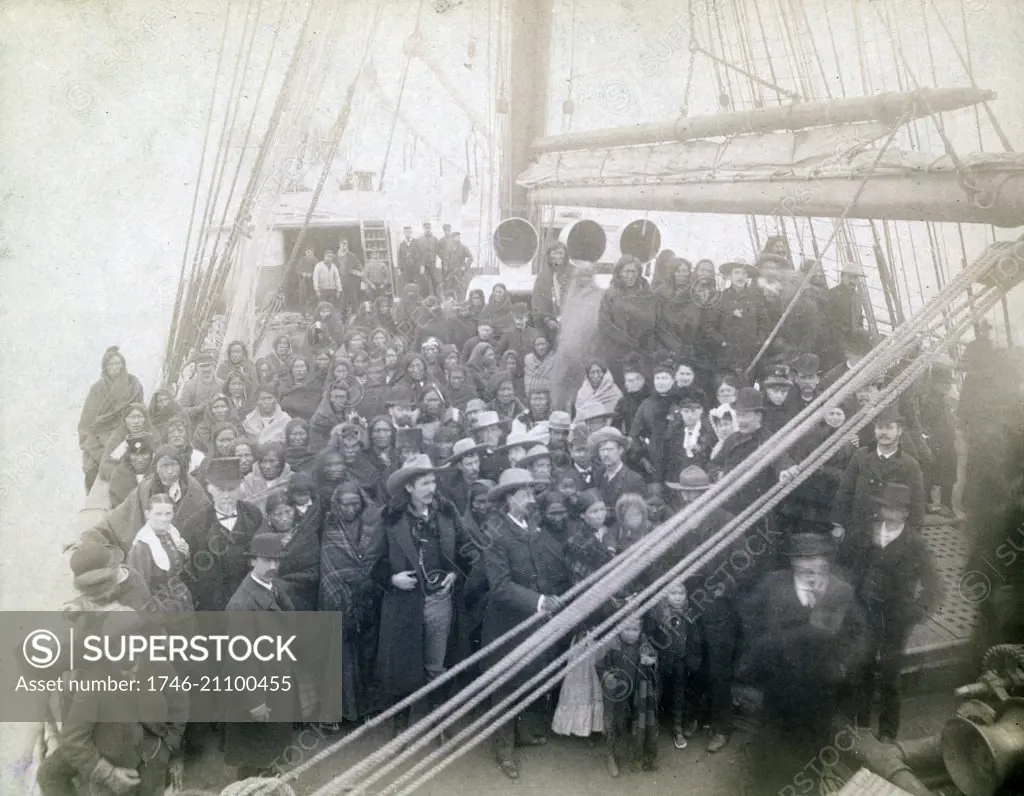 Photograph of the Chief Blue Horse, Chief American Horse, Chief Red Shirt and their families aboard the S.S. State of Nebraska in New York City. Dated 1887