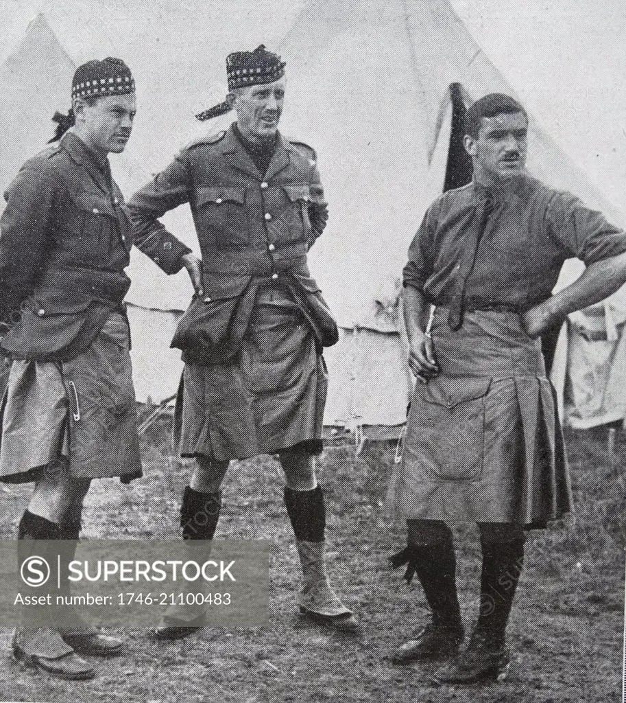 Photograph of a Canadian Scottish soldier with two British Highland regiment soldiers during World War One. Dated 1914
