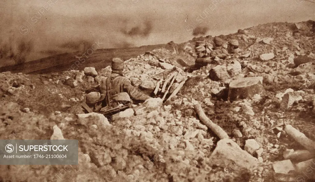 Photograph of French Soldiers under attack in trenches. Dated 1915