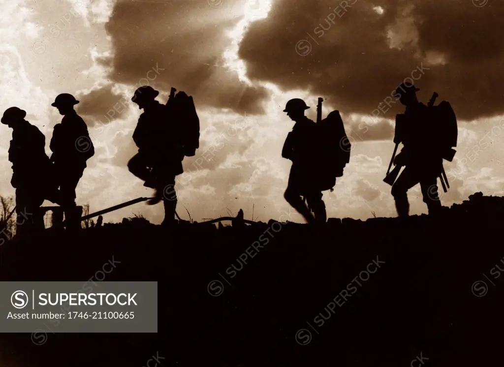 Photograph of Five Soldiers silhouetted against the sky at the Battle of Broodseinde. The Battle of Broodseinde was fought near Ypres in Flanders, at the east end of the Gheluvelt plateau, by the British Second and Fifth armies and the German Fourth Army. The Battle was the most successful Allied attack of the Battle of Passchendaele. Dated 1917