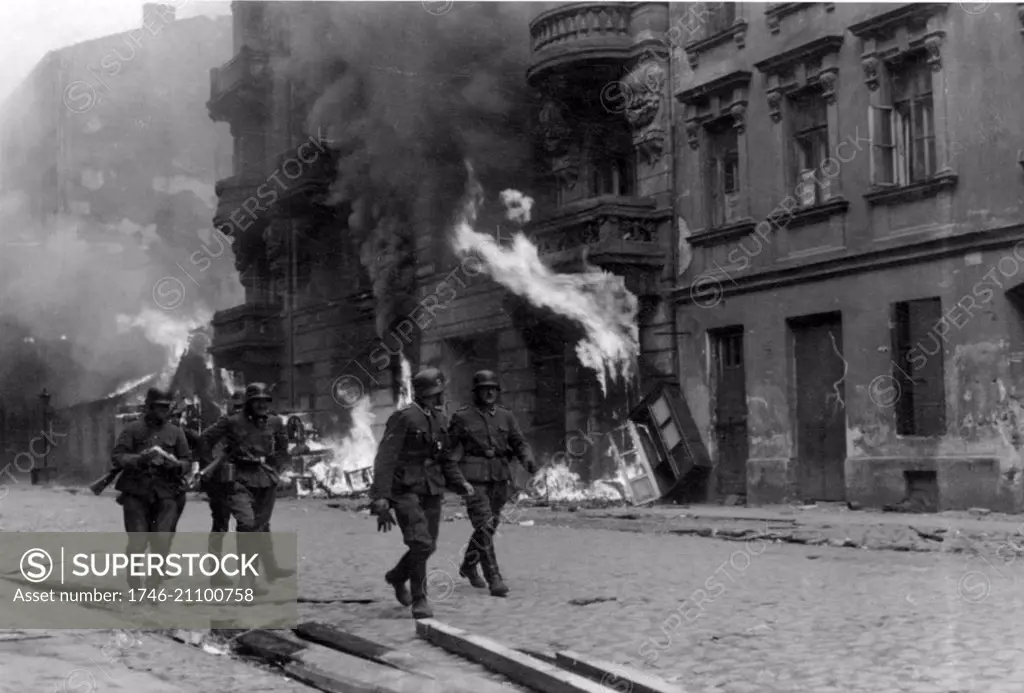 Photograph of a patrol of SS men on Nowolipie Street during the Warsaw Ghetto Uprising. Dated 1943