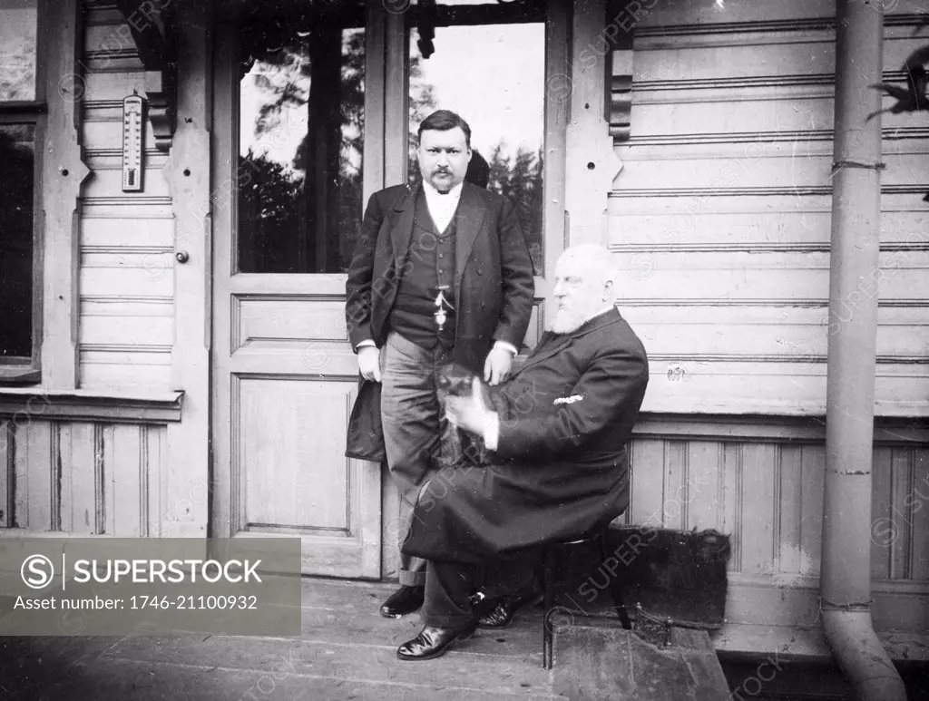 Photograph of Aleksandr Glazunov (1865-1936)(left) and Mily Balakirev (1837-1910) (seated) Russian classical composers. Dated 1908
