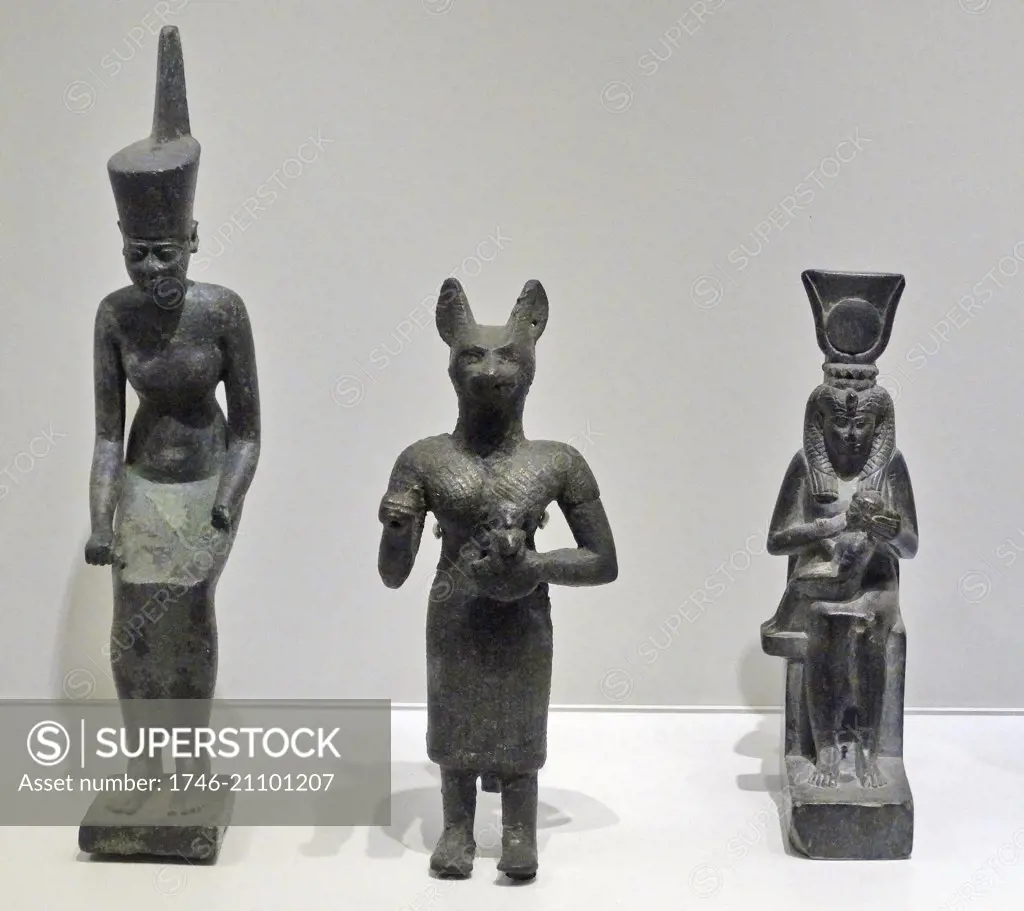 Statuettes of Neith, Bastet and Isis. The goddess of hunting and war, mother goddess and goddess of fertility and mother and protector of Horus the child respectively. 7th-2nd century.