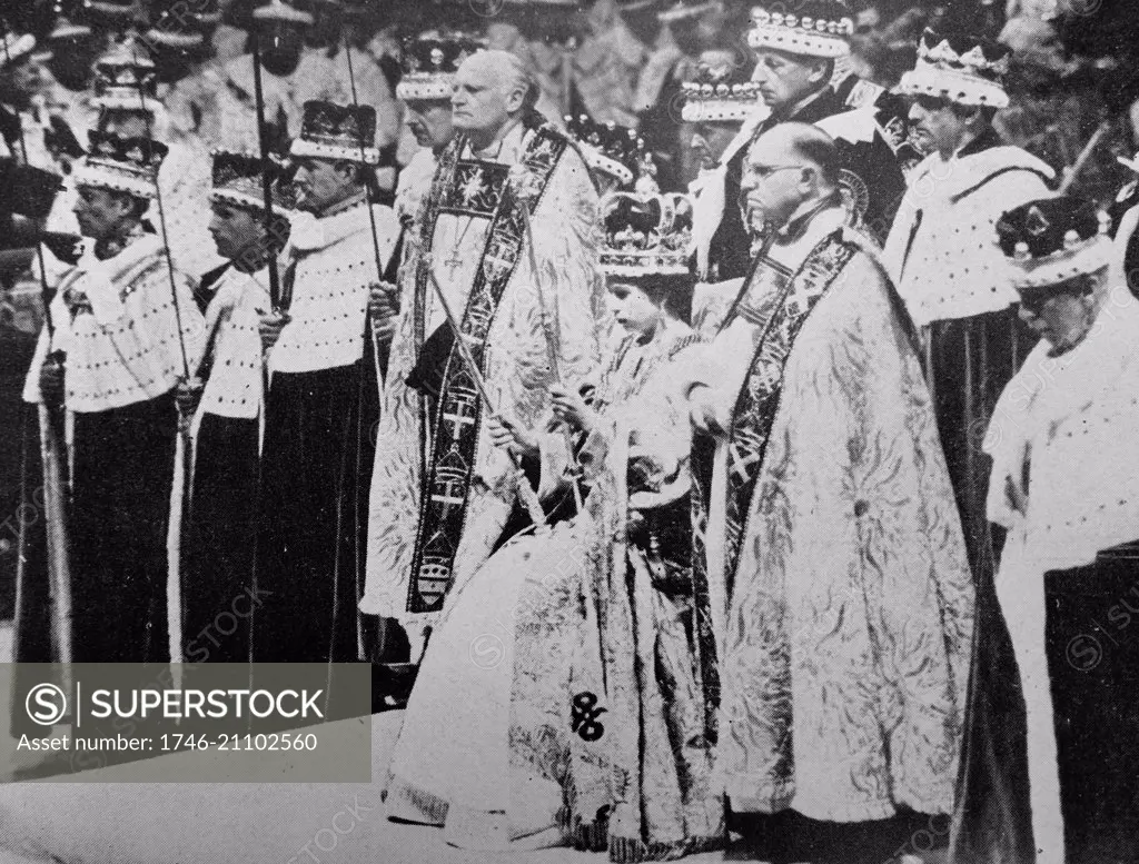 H.M. the Queen wearing St. Edward's Crown and holding the Royal Sceptre and the Rod of Equity, waits to receive the homage of her peers after her Coronation.