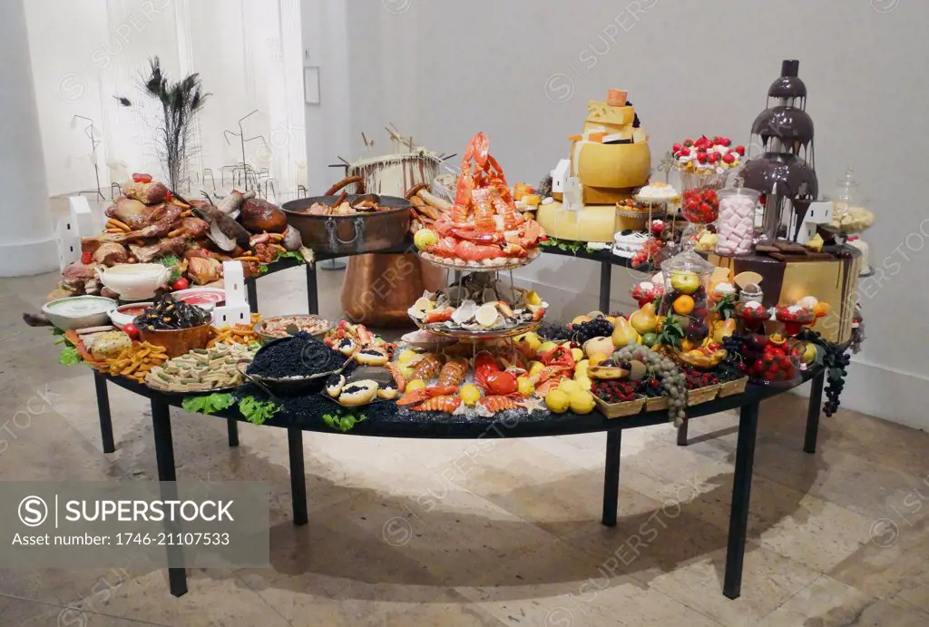 Sculpture titled 'Le Festin III' by Gilles Barbier (1965-) Ni-Vanuatu Contemporary artist. Oil painting on synthetic resin, cookware and table. Dated 2014