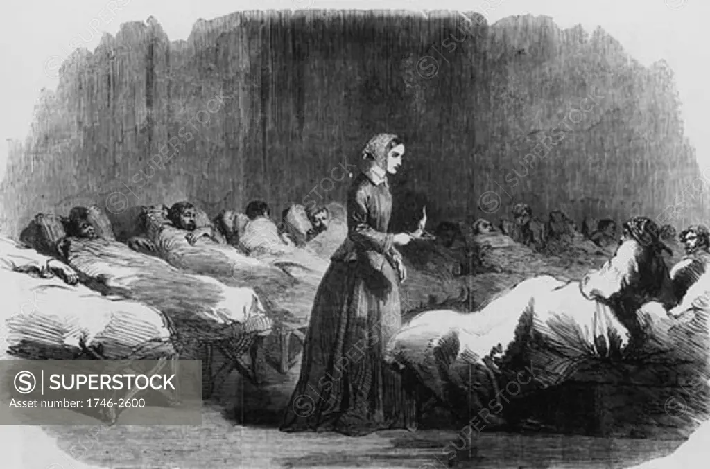 Florence Nightingale (1820-1910) English nurse, going on her rounds in the hospital at Scutari during the Crimean War. From The Illustrated London News, 1855. Wood engraving