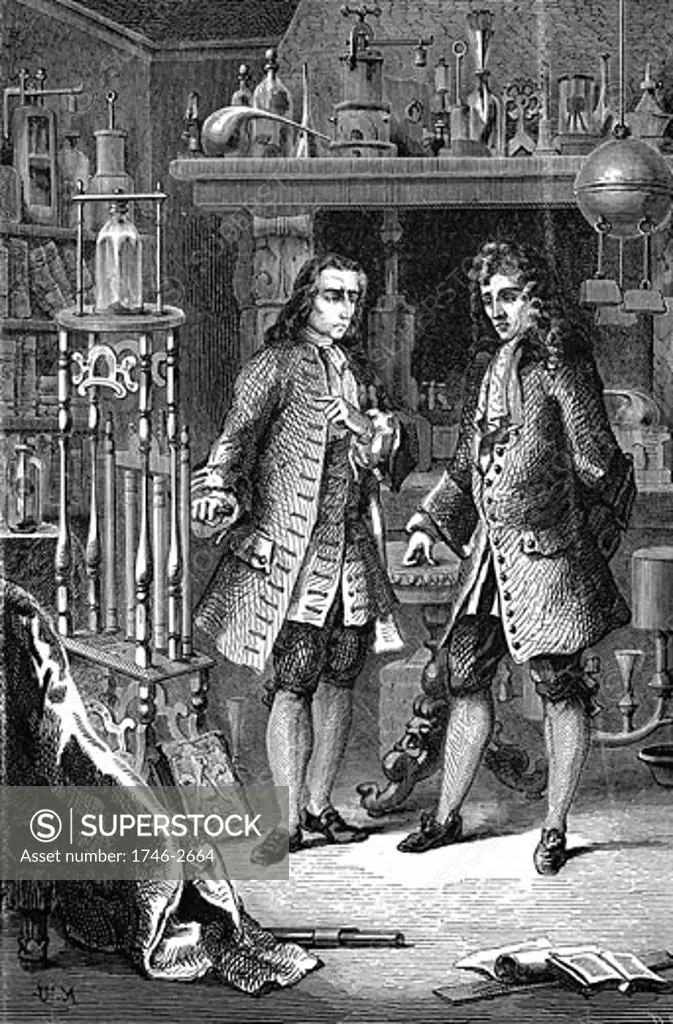 Robert Boyle (1627-91) Anglo-Irish chemist and physicist, in his laboratory with Denis Papin (1647-1712) French physicist. Papin is pointing to Boyles air pump. Probably illustrates discussion between Boyle and Papin on use of atmospheric pressure to raise water. Wood engraving Paris 1870