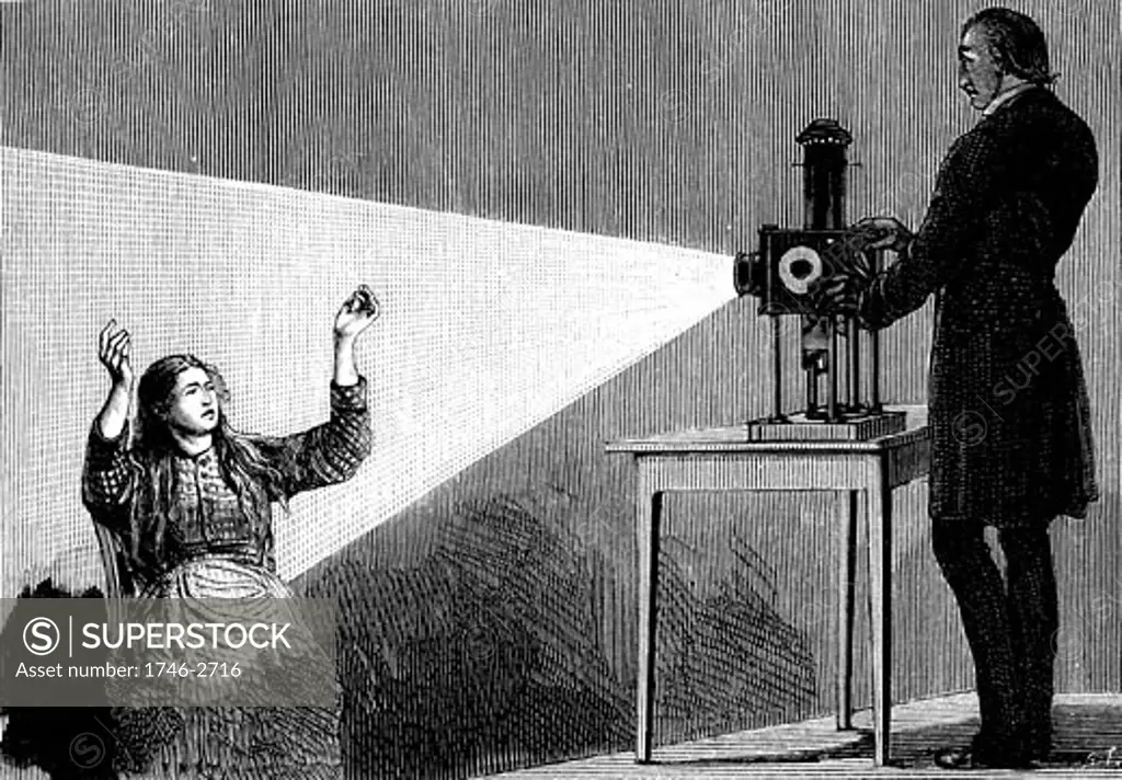 Jean-Martin Charcot (1825-1903) French neurologist and pathologist, demonstrating production of hypnosis using beam of light from a magic lantern. Picture drawn from life at the Salpetriere Hospital, Paris, Engraving from La Nature, Paris, 1879