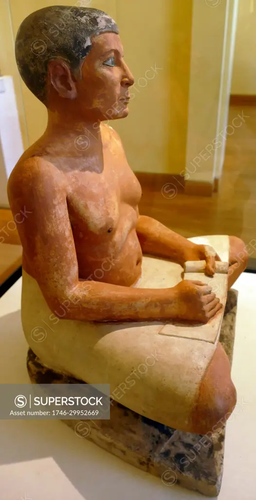 The sculpture of the Seated Scribe or Squatting Scribe is a famous work of ancient Egyptian art. It represents a figure of a seated scribe at work. The sculpture was discovered at Saqqara, north of the alley of sphinxes leading to the Serapeum of Saqqara, in 1850 and dated to the period of the Old Kingdom, from either the 5th Dynasty, c. 2450-2325 BCE or the 4th Dynasty, 2620-2500 BCE. It is now in the Louvre Museum in Paris.