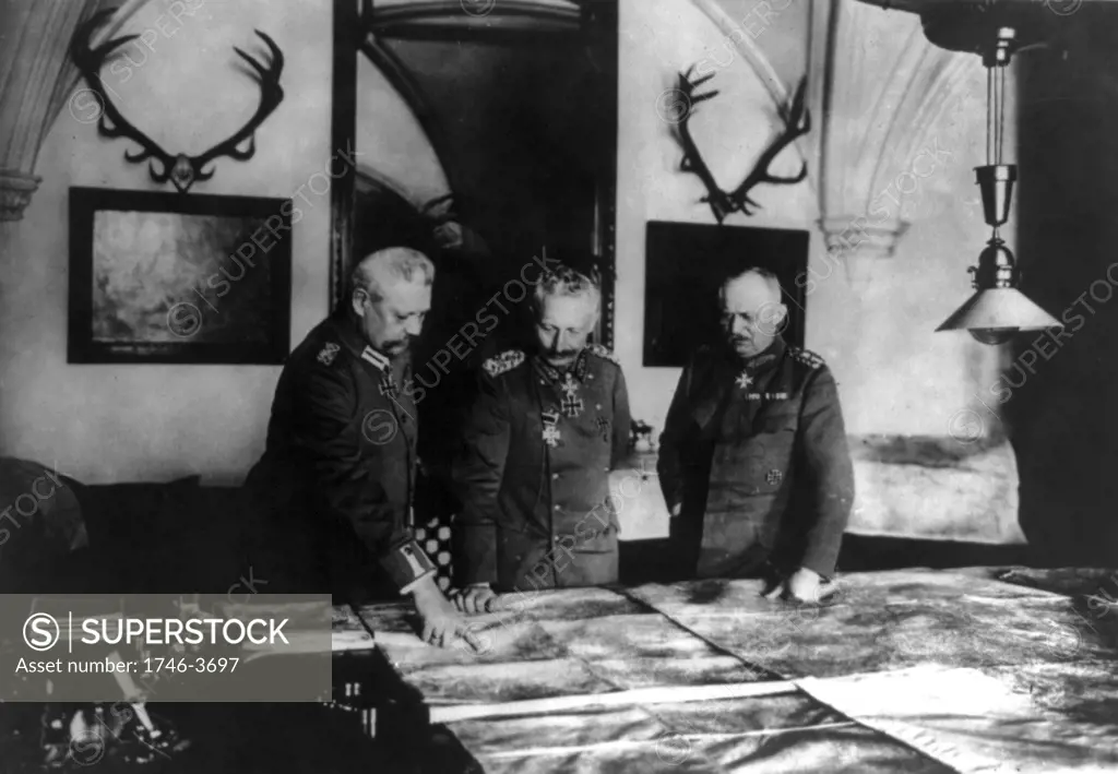 World War I: Wilhelm II of Germany studying maps with his senior commanders General Hindenburg, left, and General Ludendorf, right.