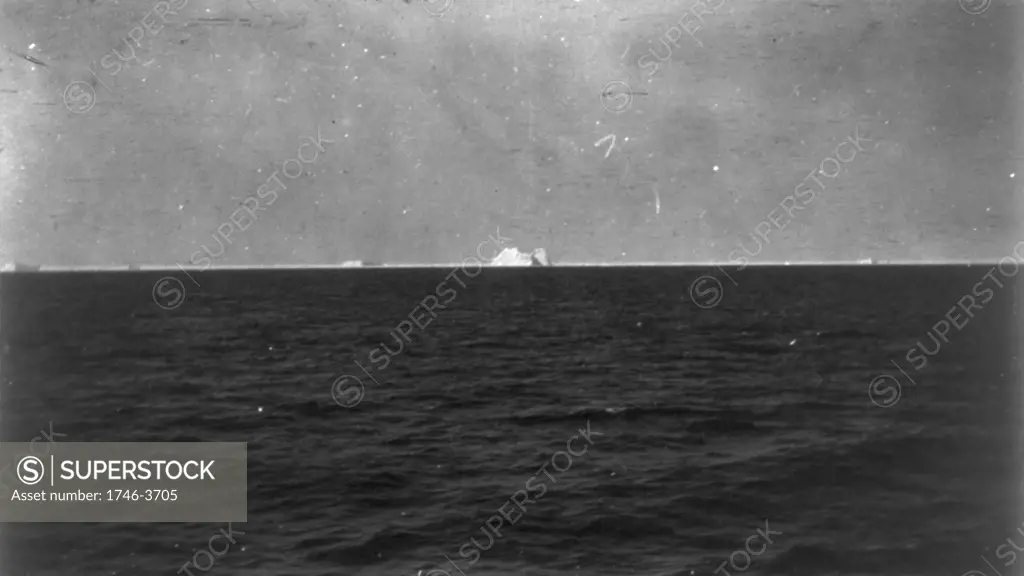 The iceberg that sank the White Star Line's Olympic-class RMS Titanic which struck it on 12 April 1912 on her maiden voyage from Liverpool to New York with loss of over 1,500 lives. View from SS Carpathia which picked up survivors.