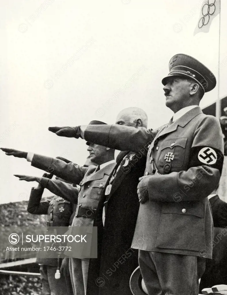 German Fuhrer Adolf Hitler takes the salute at the Berlin Olympic Games in 1936