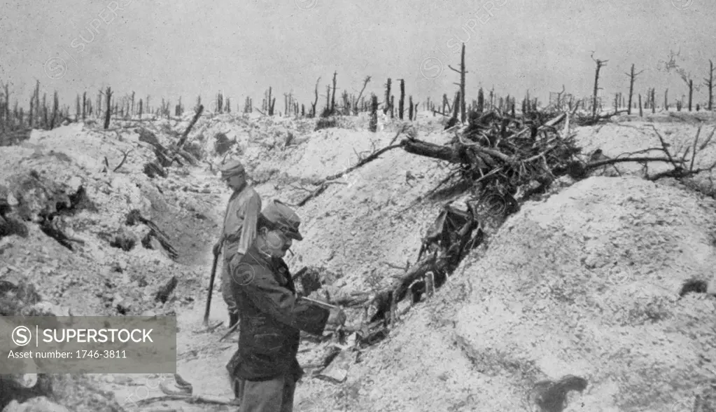 World War I 1914-1918: French soldiers in trench taken from  Germans in woodland at Mesnil-les-Haut, France, reduced to skeletons  trees by gunfire. From 'Le Flambeau', Paris, September 1915. Bombardment Destruction