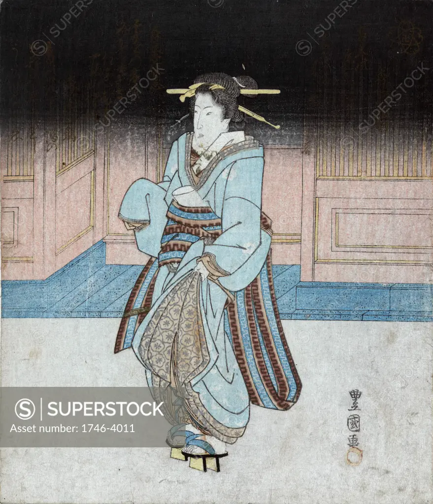 Geisha on an evening stroll in Fukagawa, c1830.  Utagawa Toyokuni (c1777-1835) Japanese Ukiyo-e artist. Geisha with traditional hairstyle in blue kimono, wearing pattens, holding robe to avoid ground.  Entertainer Female
