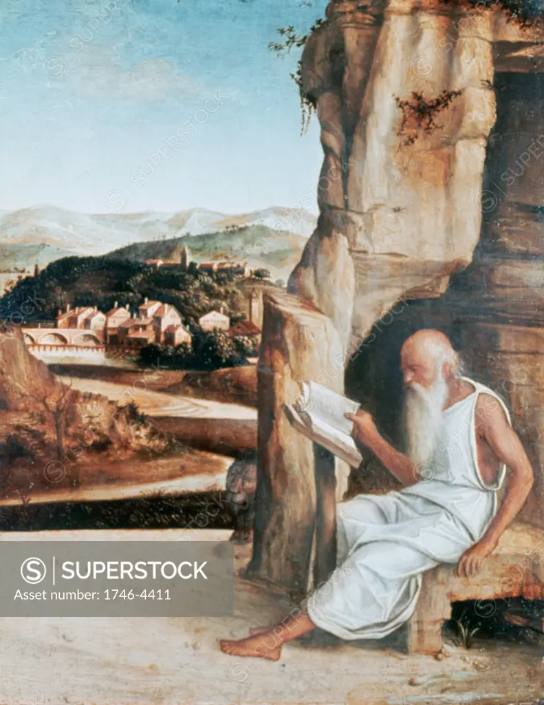 St Jerome in the Desert' attributed to Giovanni Bellini (1426-1516) Italian painter. Jerome (c340-420) a father of Western Christian Church and compiler of the Vulgate reading, his lion centre. Book Beard Cave Old Aged  Hermit