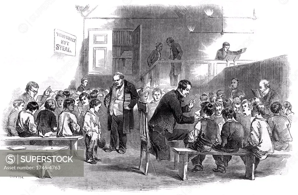 Teaching boys to read in The Ragged School Union (formed 1844) school, Lambeth, London.  From The Illustrated London News 11 April 1868. Wood engraving.