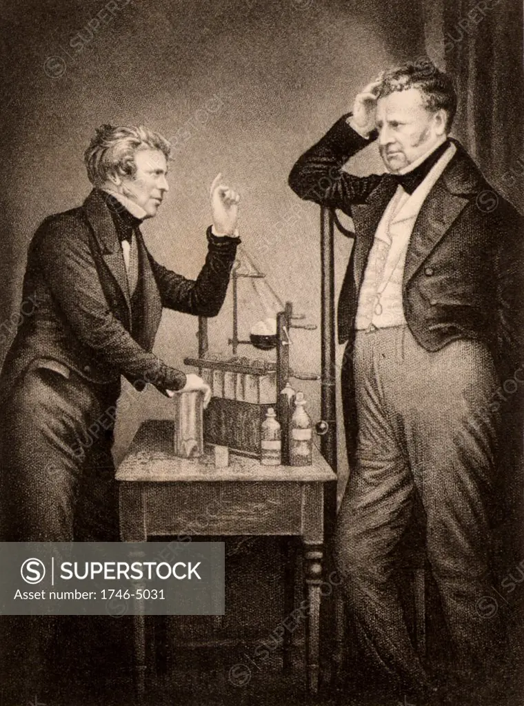 Michael Faraday (1791-1867) English chemist and physicist, left, and John Frederic Daniell (1790-1845) English chemist, physicist and meteorologist. Among his inventions were the Daniell cell, a wet storage battery, and a hygrometer.  Engraving.